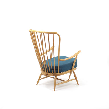Tall back armchair