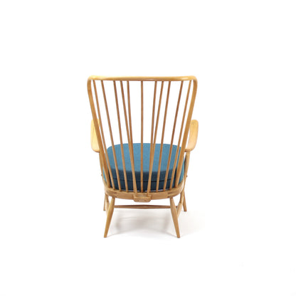 Tall back armchair