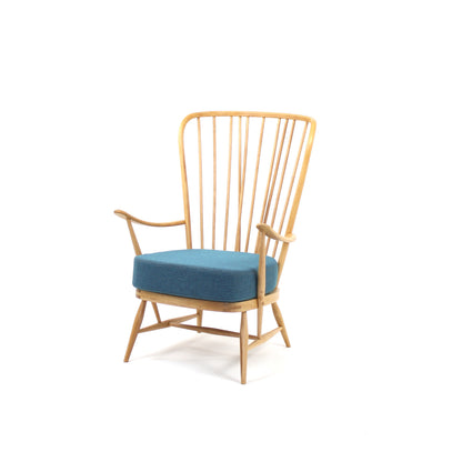 Tall back armchair