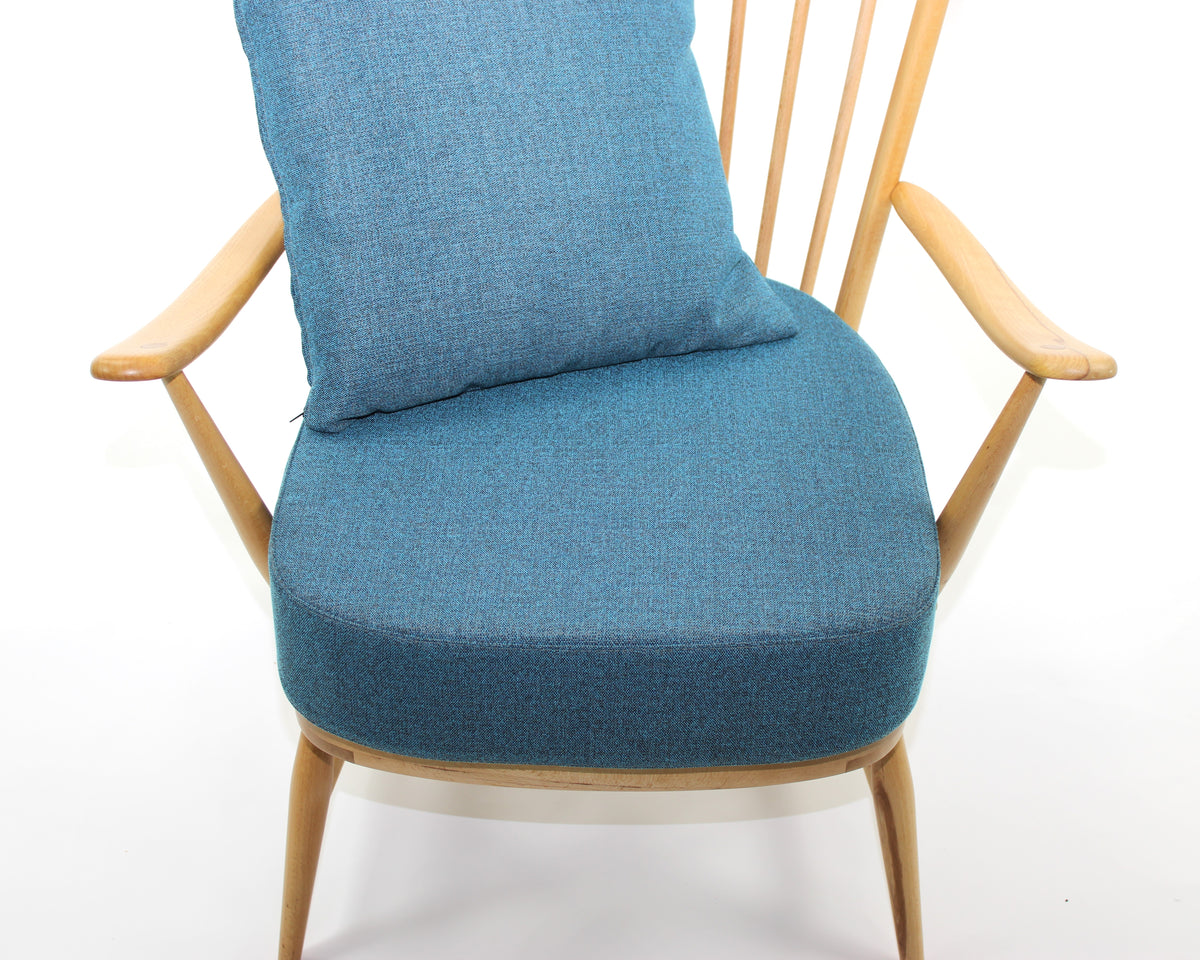 Tall back armchair
